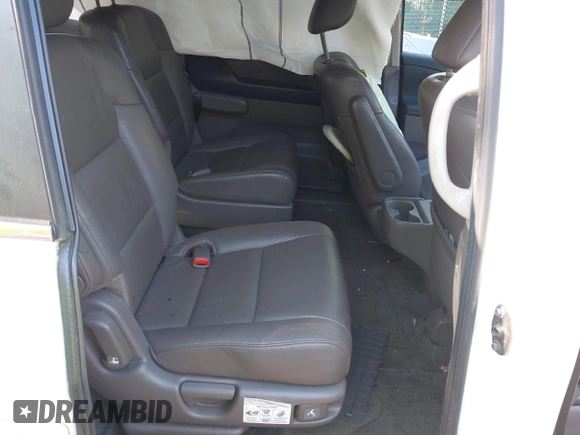 2014 Honda Odyssey EX-L with VIN 5FNRL5H63EB064854, listed as a IAAI auction lot 42102704 with 148,536 mi miles and . Bid and sale history available at carsss.com. Image 8.