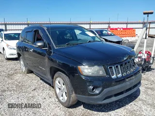 2014 Jeep Compass Sport with VIN 1C4NJCBA0ED510942, listed as a IAAI auction lot 41952596 with 196,030 mi miles and . Bid and sale history available at DreamBid. Image 1.