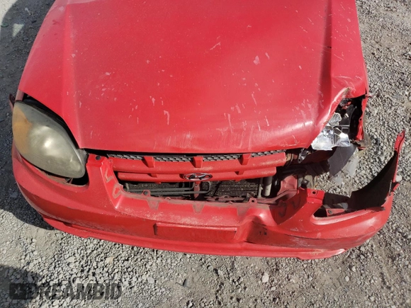 2003 Hyundai Accent with VIN KMHCF35C33U255489, listed as a Copart auction lot 75490604 with 219,457 mi miles and Salvage Title. Bid and sale history available at carsss.com. Image 12.