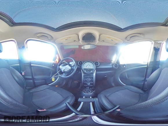 2011 MINI Countryman with VIN WMWZB3C53BWM00724, listed as a Copart auction lot 52293575 with Not Provided miles and Salvage Title. Bid and sale history available at DreamBid. Image 13.