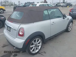 2014 MINI Convertible z VIN WMWZN3C52ET569565, wystawiony jako IAAI lot #42564988 z przebiegiem 66 035 mil mil oraz . Historia ofert i sprzedaży dostępna na DreamBid. Obrazek 4.