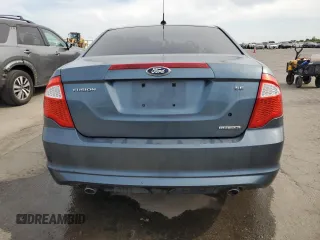 2012 Ford Fusion SE with VIN 3FAHP0HG4CR439700, listed as a Copart auction lot 55185555 with 130,453 mi miles and Clean Title. Bid and sale history available at DreamBid. Image 6.