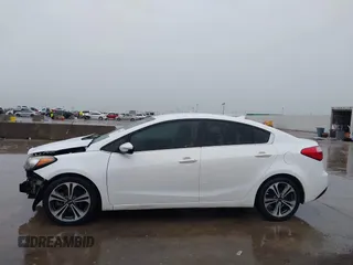 2016 Kia Forte EX with VIN KNAFX4A82G5450616, listed as a IAAI auction lot 42107042 with 131,419 mi miles. Bid and sale history available at carsss.com. Image 15.