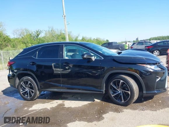 2019 Lexus RX 350 with VIN 2T2ZZMCA3KC145305, listed as a IAAI auction lot 42036498 with 102,678 mi miles and . Bid and sale history available at DreamBid. Image 12.