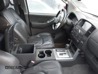 2008 Nissan Pathfinder S with VIN 5N1AR18U28C634844, listed as a IAAI auction lot 41209390 with 203,949 mi miles. Bid and sale history available at carsss.com. Image 5.