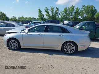 2014 Lincoln MKZ Hybrid with VIN 3LN6L2LU5ER822663, listed as a IAAI auction lot 42656735 with 122,025 mi miles and . Bid and sale history available at DreamBid. Image 14.
