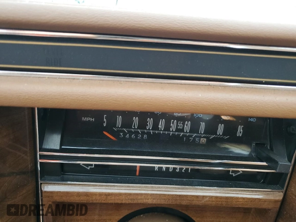 1988 Cadillac Brougham z VIN 1G6DW51Y5J9727006, wystawiony jako Copart lot #70573614 z przebiegiem 34 628 mil mil oraz Szkody całkowita. Historia ofert i sprzedaży dostępna na DreamBid. Obrazek 9.