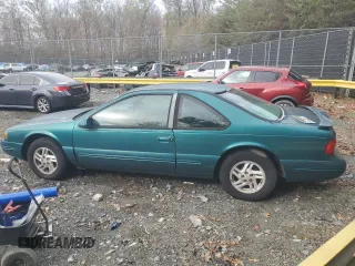1997 Ford Thunderbird LX with VIN 1FALP6245VH171563, listed as a Copart auction lot 81970734 with 67,304 mi miles and Clean Title. Bid and sale history available at DreamBid. Image 2.