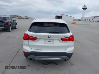 2016 BMW X1 xDrive28i with VIN WBXHT3C35GP886144, listed as a IAAI auction lot 41954742 with 89,268 mi miles. Bid and sale history available at carsss.com. Image 17.