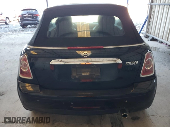 2012 MINI Convertible z VIN WMWZN3C55CT134262, wystawiony jako Copart lot #38224724 z przebiegiem 58 082 mil mil oraz Nie do naprawy • Non repairable. Historia ofert i sprzedaży dostępna na DreamBid. Obrazek 6.