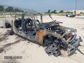 2023 Jeep Gladiator Sport S z VIN 1C6HJTAG8PL558868, wystawiony jako IAAI lot #42264859 z przebiegiem Nie podano mil oraz . Historia ofert i sprzedaży dostępna na DreamBid. Obrazek 1.