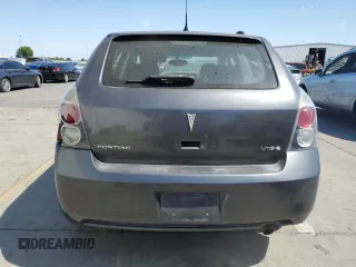 2009 Pontiac Vibe 1SB with VIN 5Y2SP67049Z458291, listed as a Copart auction lot 63234065 with 217,986 mi miles and Salvage title. Bid and sale history available at DreamBid. Image 6.