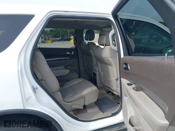 2013 Dodge Durango SXT with VIN 1C4RDHAG1DC669503, listed as a IAAI auction lot 42614210 with 103,482 mi miles and . Bid and sale history available at DreamBid. Image 8.