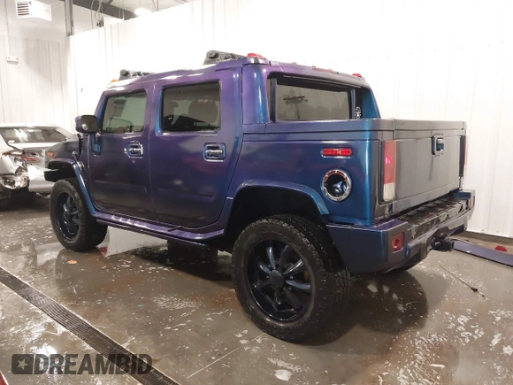2006 Hummer H2 z VIN 5GRGN22U06H103603, wystawiony jako IAAI lot #41992767 z przebiegiem 165 782 mil mil oraz . Historia ofert i sprzedaży dostępna na DreamBid. Obrazek 3.
