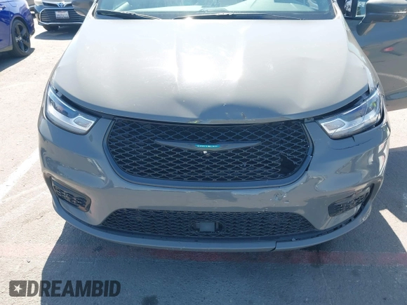 2021 Chrysler Pacifica Hybrid Limited z VIN 2C4RC1S76MR544495, wystawiony jako IAAI lot #42294312 z przebiegiem 89 083 mil mil oraz . Historia ofert i sprzedaży dostępna na DreamBid. Obrazek 17.