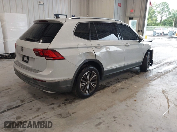 2019 Volkswagen Tiguan SE with VIN 3VV3B7AX9KM030028, listed as a IAAI auction lot 40445099 with 85,400 mi miles and . Bid and sale history available at DreamBid. Image 4.