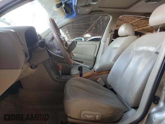 2002 Infiniti I35 Luxury z VIN JNKDA31A22T022606, wystawiony jako Copart lot #55158005 z przebiegiem 136 847 mil mil oraz Szkoda całkowita • Salvage title. Historia ofert i sprzedaży dostępna na DreamBid. Obrazek 7.