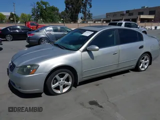 2005 Nissan Altima 3.5 SE with VIN 1N4BL11D85C199530, listed as a IAAI auction lot 42096983 with 92,906 mi miles. Bid and sale history available at carsss.com. Image 2.