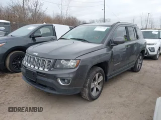 2016 Jeep Compass High Altitude Edition with VIN 1C4NJCEAXGD760221, listed as a IAAI auction lot 41486540 with 104,900 mi miles. Bid and sale history available at carsss.com. Image 2.