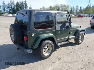 1997 Jeep Wrangler Sahara with VIN 1J4FY49S4VP523156, listed as a IAAI auction lot 42046797 with 193,408 mi miles. Bid and sale history available at carsss.com. Image 4.