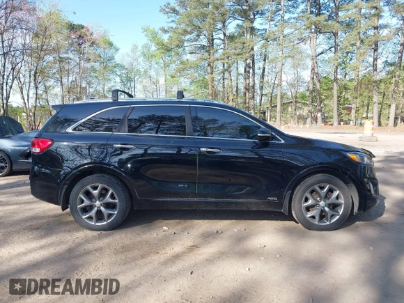 2016 Kia Sorento SX with VIN 5XYPKDA58GG127772, listed as a IAAI auction lot 42002092 with 138,367 mi miles and . Bid and sale history available at DreamBid. Image 13.