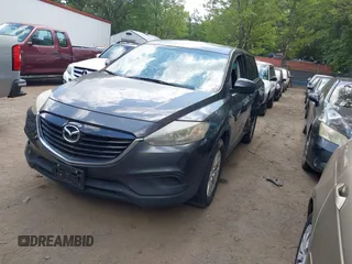 2013 Mazda CX-9 Touring with VIN JM3TB3CA4D0405708, listed as a IAAI auction lot 42796644 with 201,258 mi miles and . Bid and sale history available at DreamBid. Image 2.