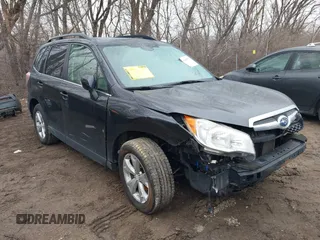 2014 Subaru Forester 2.5i Touring with VIN JF2SJAPC2EH552590, listed as a IAAI auction lot 41490583 with 84,538 mi miles. Bid and sale history available at carsss.com. Image 1.
