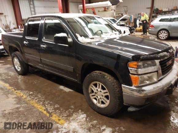 2009 GMC Canyon SLE1 with VIN 1GTDT13E698103718, listed as a IAAI auction lot 41581701 with 129,766 mi miles. Bid and sale history available at carsss.com. Image 1.
