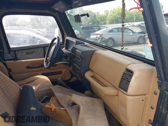 1998 Jeep Wrangler SE with VIN 1J4FY29P8WP793427, listed as a IAAI auction lot 42546515 with 145,388 mi miles and . Bid and sale history available at DreamBid. Image 5.