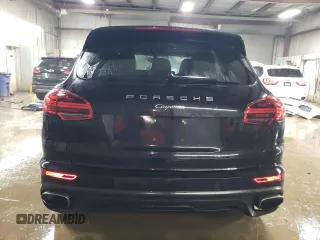 2016 Porsche Cayenne z VIN WP1AA2A20GLA05428, wystawiony jako Copart lot #52168225 z przebiegiem 90 749 mil mil oraz Szkoda całkowita • Salvage title. Historia ofert i sprzedaży dostępna na DreamBid. Obrazek 6.