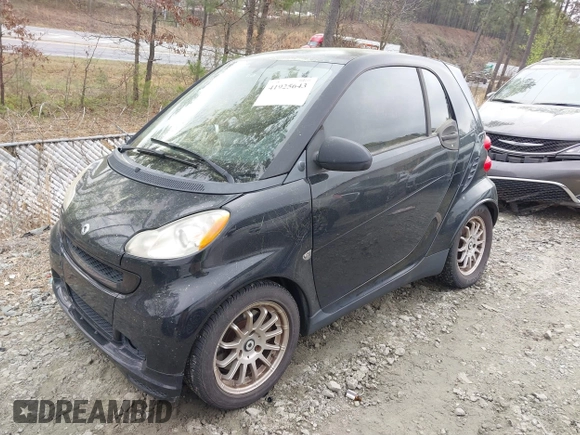 2009 Smart fortwo Pure with VIN WMEEJ31X69K244948, listed as a IAAI auction lot 41925643 with 129,877 mi miles and . Bid and sale history available at DreamBid. Image 2.