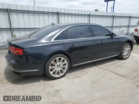 2015 Audi A8 4.0T z VIN WAU32AFD8FN001493, wystawiony jako Copart lot #57394315 z przebiegiem 120 464 mil mil oraz Szkoda całkowita • Salvage title. Historia ofert i sprzedaży dostępna na DreamBid. Obrazek 3.