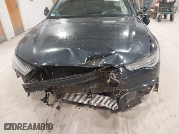 2016 Audi A6 Premium Plus with VIN WAUGFAFC9GN121205, listed as a IAAI auction lot 41770789 with 131,480 mi miles and . Bid and sale history available at DreamBid. Image 12.