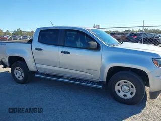 2020 Chevrolet Colorado 4WD Work Truck z VIN 1GCGTBENXL1205894, wystawiony jako IAAI lot #41058177 z przebiegiem 61 374 mil mil oraz . Historia ofert i sprzedaży dostępna na DreamBid. Obrazek 13.