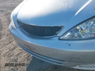 2004 Toyota Camry LE with VIN 4T1BE32K54U889401, listed as a IAAI auction lot 41778562 with Not Provided miles and . Bid and sale history available at carsss.com. Image 6.