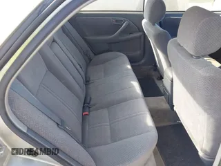 2000 Toyota Camry CE z VIN JT2BG22K6Y0433633, wystawiony jako IAAI lot #42409568 z przebiegiem 119 672 mil mil oraz . Historia ofert i sprzedaży dostępna na DreamBid. Obrazek 8.