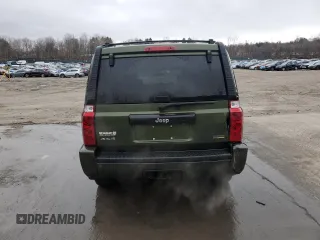 2007 Jeep Commander Sport z VIN 1J8HG48P97C622153, wystawiony jako Copart lot #50291165 z przebiegiem 113 516 mil mil oraz Szkoda całkowita • Salvage title. Historia ofert i sprzedaży dostępna na DreamBid. Obrazek 6.