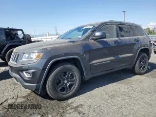 2014 Jeep Grand Cherokee Laredo with VIN 1C4RJEAG7EC212915, listed as a Copart auction lot 51571855 with 169,851 mi miles and Clean Title. Bid and sale history available at carsss.com. Image 1.