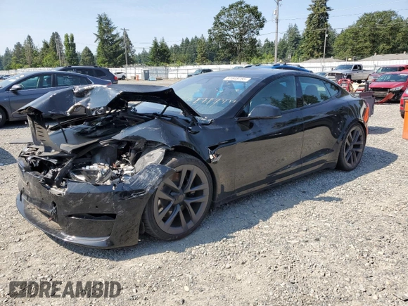 2021 Tesla Model S Plaid with VIN 5YJSA1E66MF434066, listed as a Copart auction lot 61648755 with Not provided miles and Salvage title. Bid and sale history available at DreamBid. Image 1.