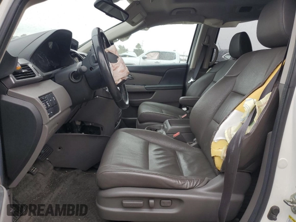 2014 Honda Odyssey Touring z VIN 5FNRL5H91EB089813, wystawiony jako Copart lot #58674275 z przebiegiem Nie podano mil oraz Szkoda całkowita • Salvage title. Historia ofert i sprzedaży dostępna na DreamBid. Obrazek 7.