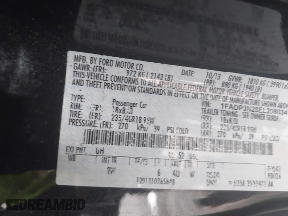 2014 Ford Focus Titanium z VIN 1FADP3N28EL208034, wystawiony jako IAAI lot #42426943 z przebiegiem 220 891 mil mil oraz . Historia ofert i sprzedaży dostępna na DreamBid. Obrazek 9.
