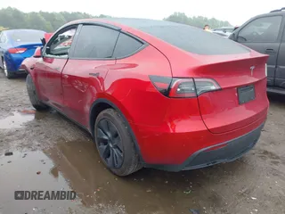 2024 Tesla Model Y z VIN 7SAYGDED9RA304010, wystawiony jako IAAI lot #42366995 z przebiegiem Nie podano mil oraz . Historia ofert i sprzedaży dostępna na DreamBid. Obrazek 3.