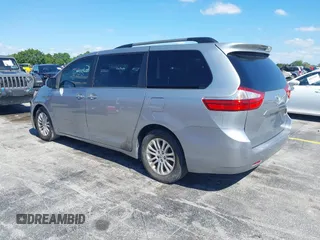 2015 Toyota Sienna XLE with VIN 5TDYK3DC3FS631916, listed as a IAAI auction lot 42043495 with 76,986 mi miles and . Bid and sale history available at DreamBid. Image 3.