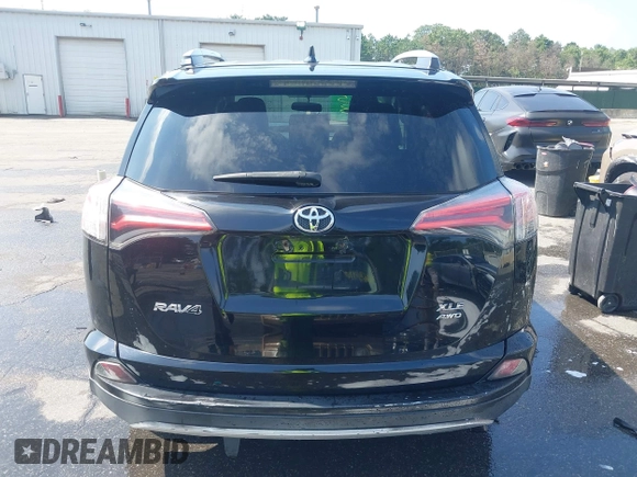 2016 Toyota RAV4 XLE with VIN 2T3RFREV9GW458057, listed as a IAAI auction lot 42651373 with 119,750 mi miles and . Bid and sale history available at DreamBid. Image 16.