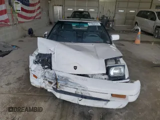 1989 Toyota MR2 z VIN JT2AW15J7K0154517, wystawiony jako Copart lot #77944134 z przebiegiem 204 412 mil mil oraz Szkody całkowita. Historia ofert i sprzedaży dostępna na DreamBid. Obrazek 5.