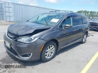 2020 Chrysler Pacifica Touring L with VIN 2C4RC1BG1LR269004, listed as a IAAI auction lot 42287228 with 71,498 mi miles and . Bid and sale history available at DreamBid. Image 17.