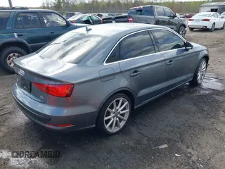 2015 Audi A3 Premium Plus z VIN WAUCJGFF4F1078134, wystawiony jako IAAI lot #41909858 z przebiegiem 92 413 mil mil oraz . Historia ofert i sprzedaży dostępna na DreamBid. Obrazek 4.
