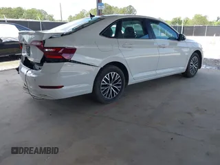 2021 Volkswagen Jetta S with VIN 3VWC57BU0MM013922, listed as a IAAI auction lot 42270877 with 36,741 mi miles and . Bid and sale history available at DreamBid. Image 4.