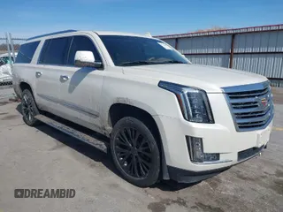 2015 Cadillac Escalade ESV Platinum z VIN 1GYS4UKJ1FR734591, wystawiony jako IAAI lot #41762908 z przebiegiem 111 994 mil mil oraz . Historia ofert i sprzedaży dostępna na DreamBid. Obrazek 1.