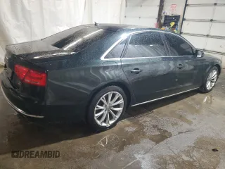 2011 Audi A8 z VIN WAURVAFD7BN006275, wystawiony jako Copart lot #58306205 z przebiegiem 190 383 mil mil oraz Szkody całkowita. Historia ofert i sprzedaży dostępna na DreamBid. Obrazek 3.